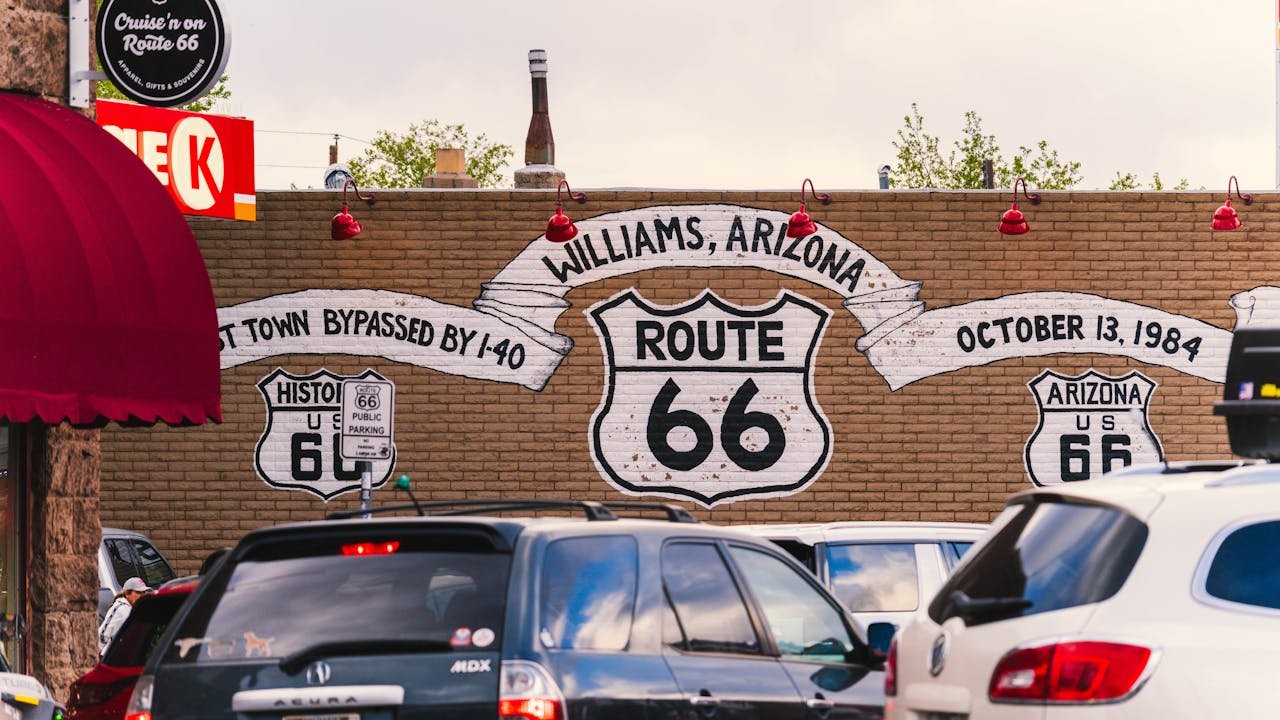 our-journey-03 Vibrant mural celebrating Route 66 on a street in Williams, Arizona.